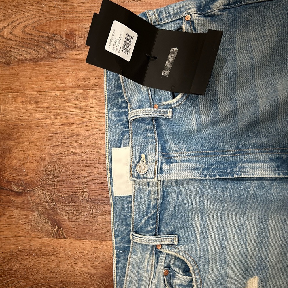 MOTHER Women's High-Rise Light Blue Faded Jeans